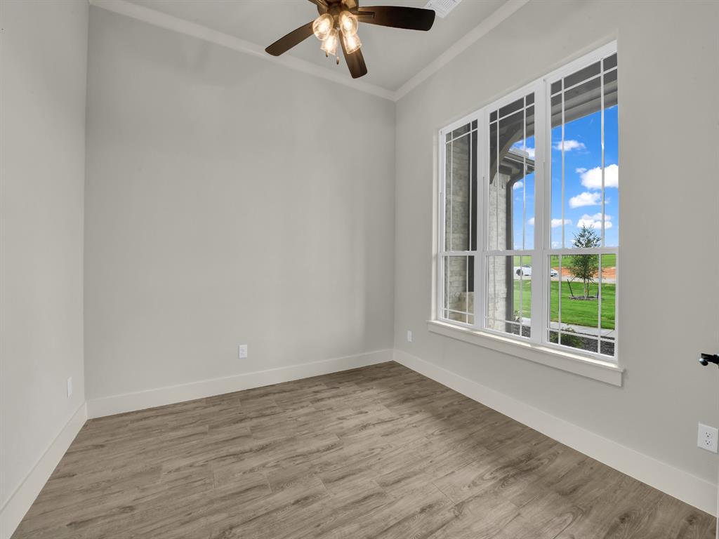 313 Wrangler Court Weatherford, TX 76088 - Photo 27 of 40 a view of an empty room with a window