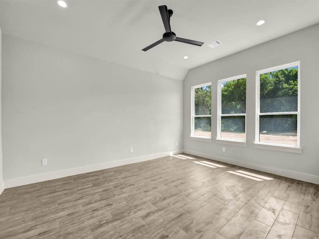 313 Wrangler Court Weatherford, TX 76088 - Photo 28 of 40 a view of an empty room with a window