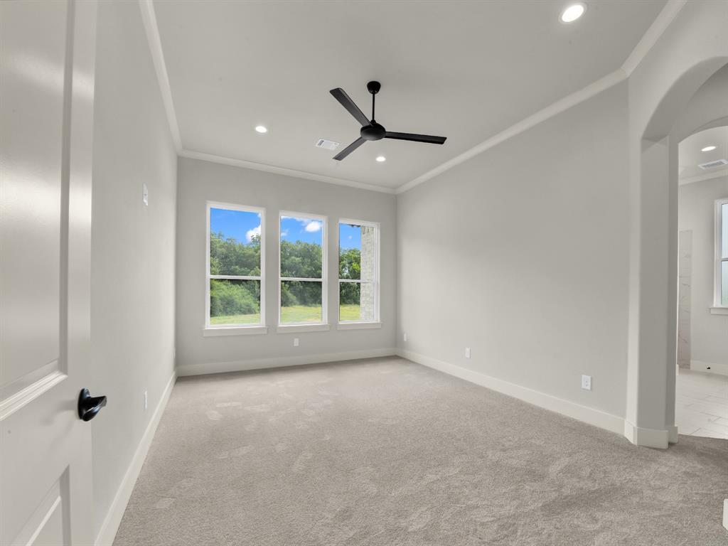 313 Wrangler Court Weatherford, TX 76088 - Photo 32 of 40 a view of an empty room with a window