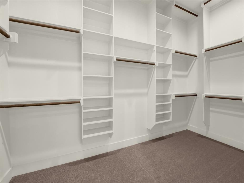 313 Wrangler Court Weatherford, TX 76088 - Photo 34 of 40 a view of an empty walk in closet
