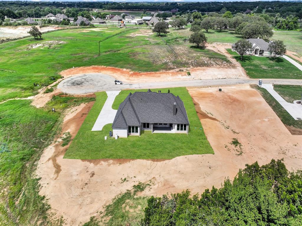 313 Wrangler Court Weatherford, TX 76088 - Photo 10 of 40 a view of a park with large trees