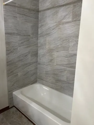 a bathroom with a bathtub