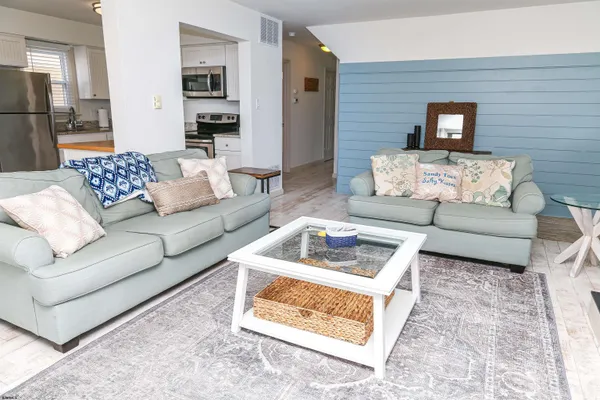 a living room with furniture and a couch