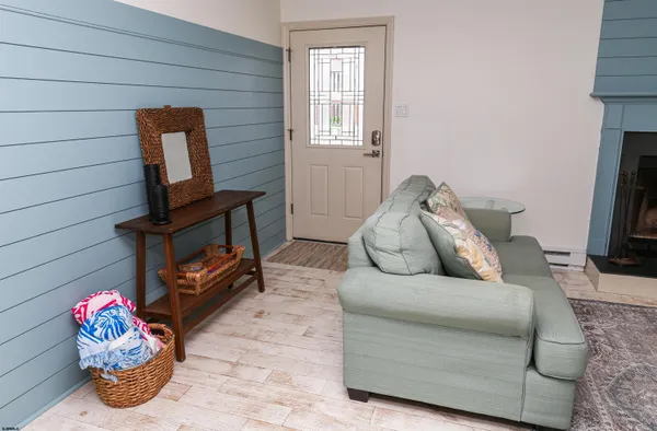 a bedroom with a bed and a lamp