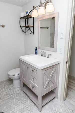 a bathroom with a bathtub and shower