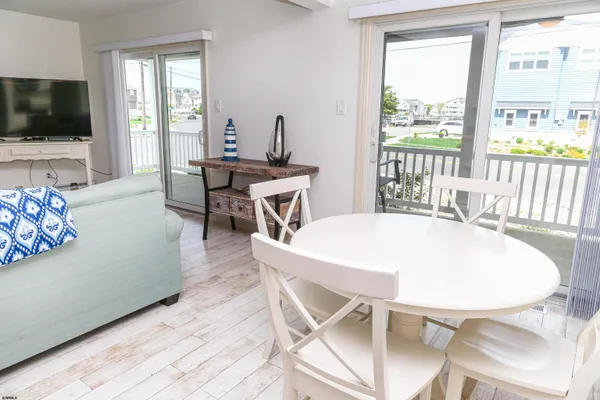 a bedroom with a bed and a lamp