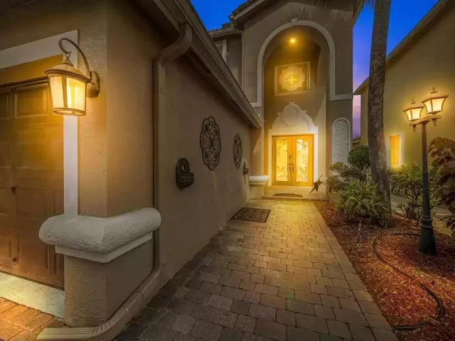 a view of a entryway door with couch