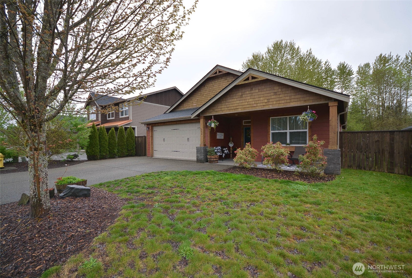 259 Parkside Loop Chehalis, WA 98532 - Photo 1 of 39 a view of a house with a yard and sitting area