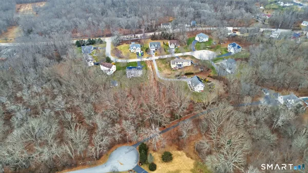 a view of a backyard with green space