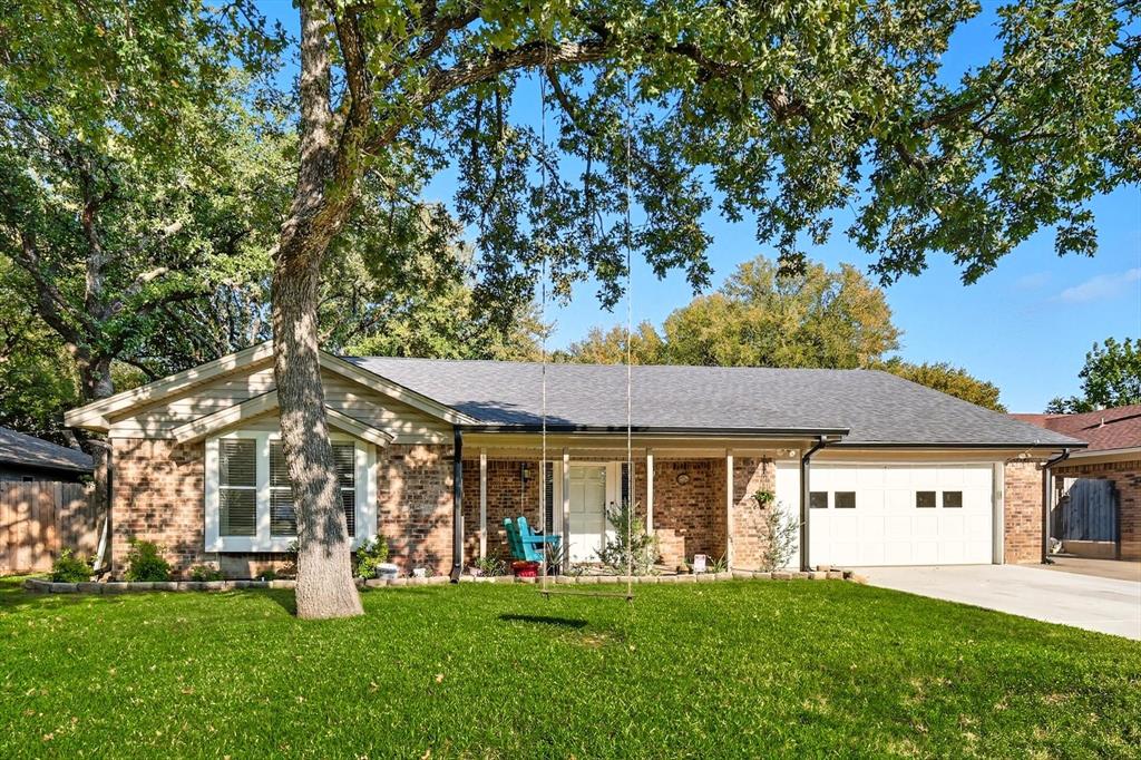 2908 Steve Drive Hurst, TX 76054 - Photo 1 of 1 a front view of a house with a garden