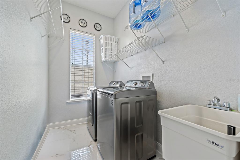 155 Hidden Woods Cove Altamonte Springs, FL 32701 - Photo 15 of 20 a utility room with dryer and washer