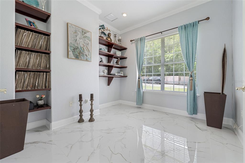 155 Hidden Woods Cove Altamonte Springs, FL 32701 - Photo 4 of 20 a view of an empty room with a window