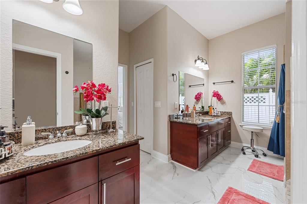 155 Hidden Woods Cove Altamonte Springs, FL 32701 - Photo 8 of 20 a living room with granite countertop furniture and a mirror