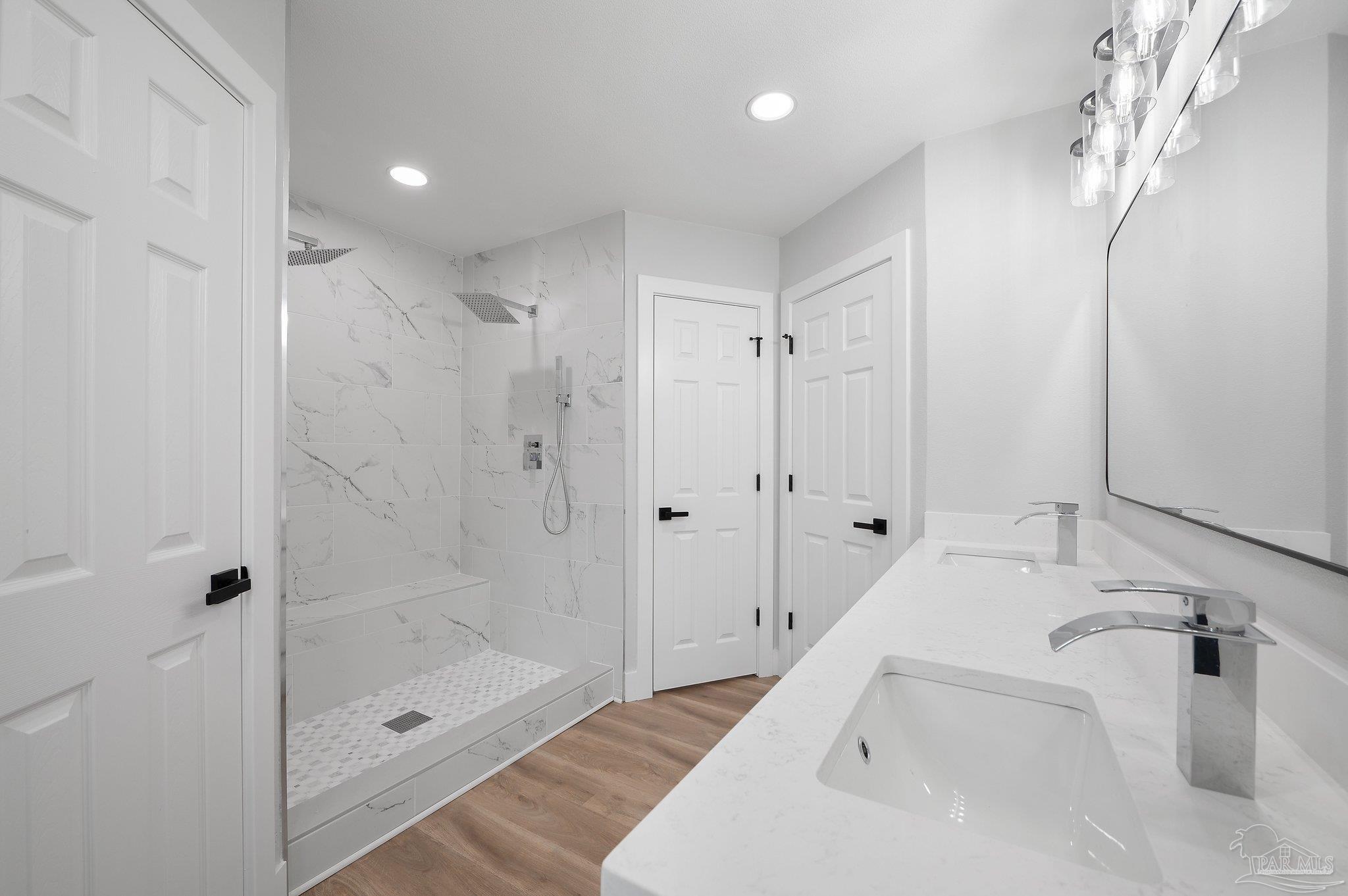 4290 Idell Lane Pace, FL 32571 - Photo 25 of 45 a bathroom with a bathtub and a shower