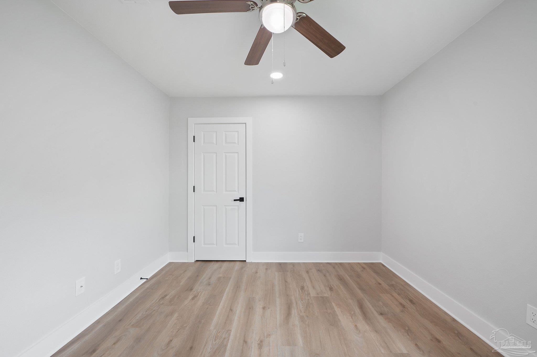 4290 Idell Lane Pace, FL 32571 - Photo 33 of 45 a view of an empty room and wooden floor