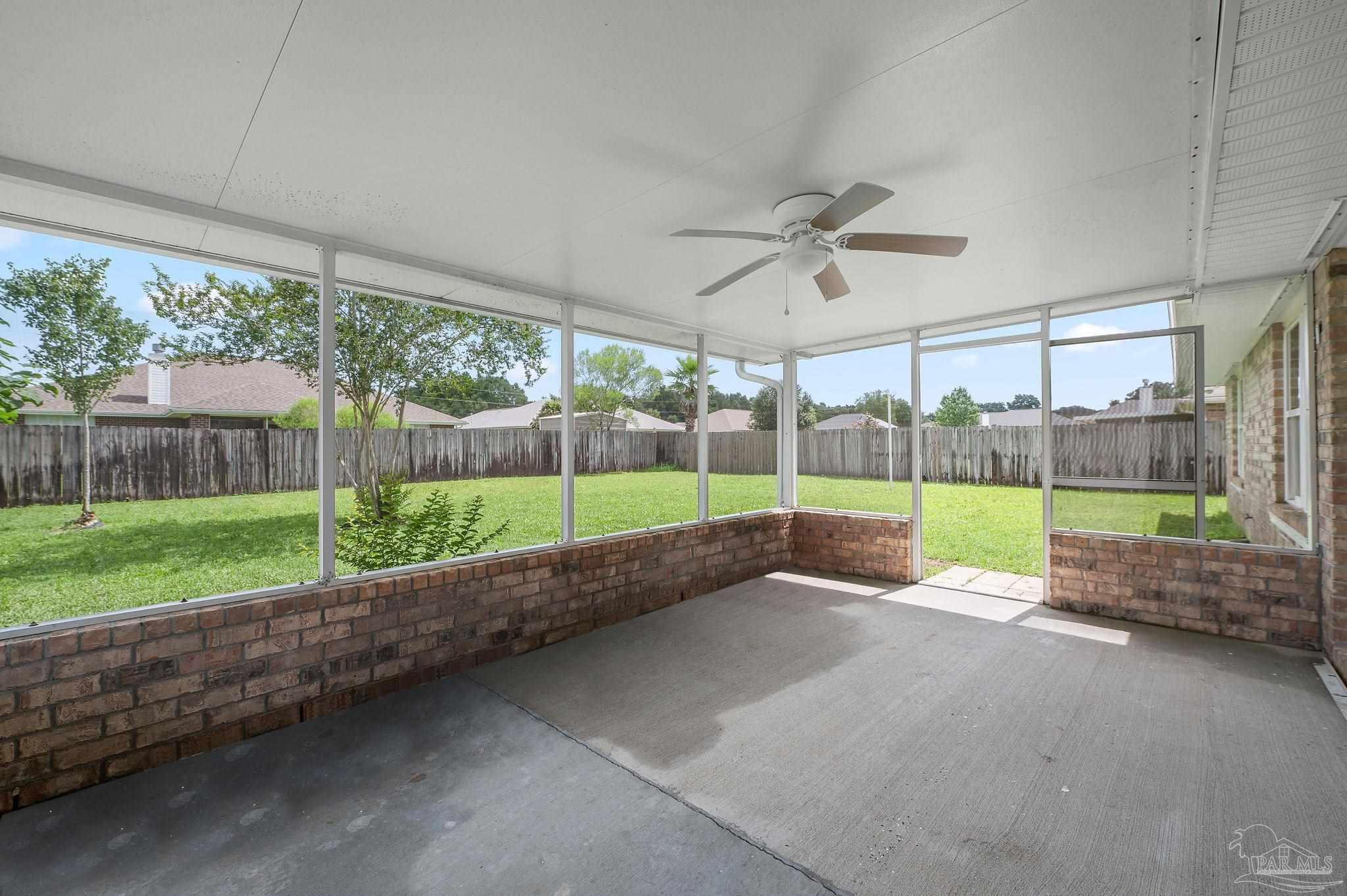 4290 Idell Lane Pace, FL 32571 - Photo 37 of 45 a view of a garden with an empty space