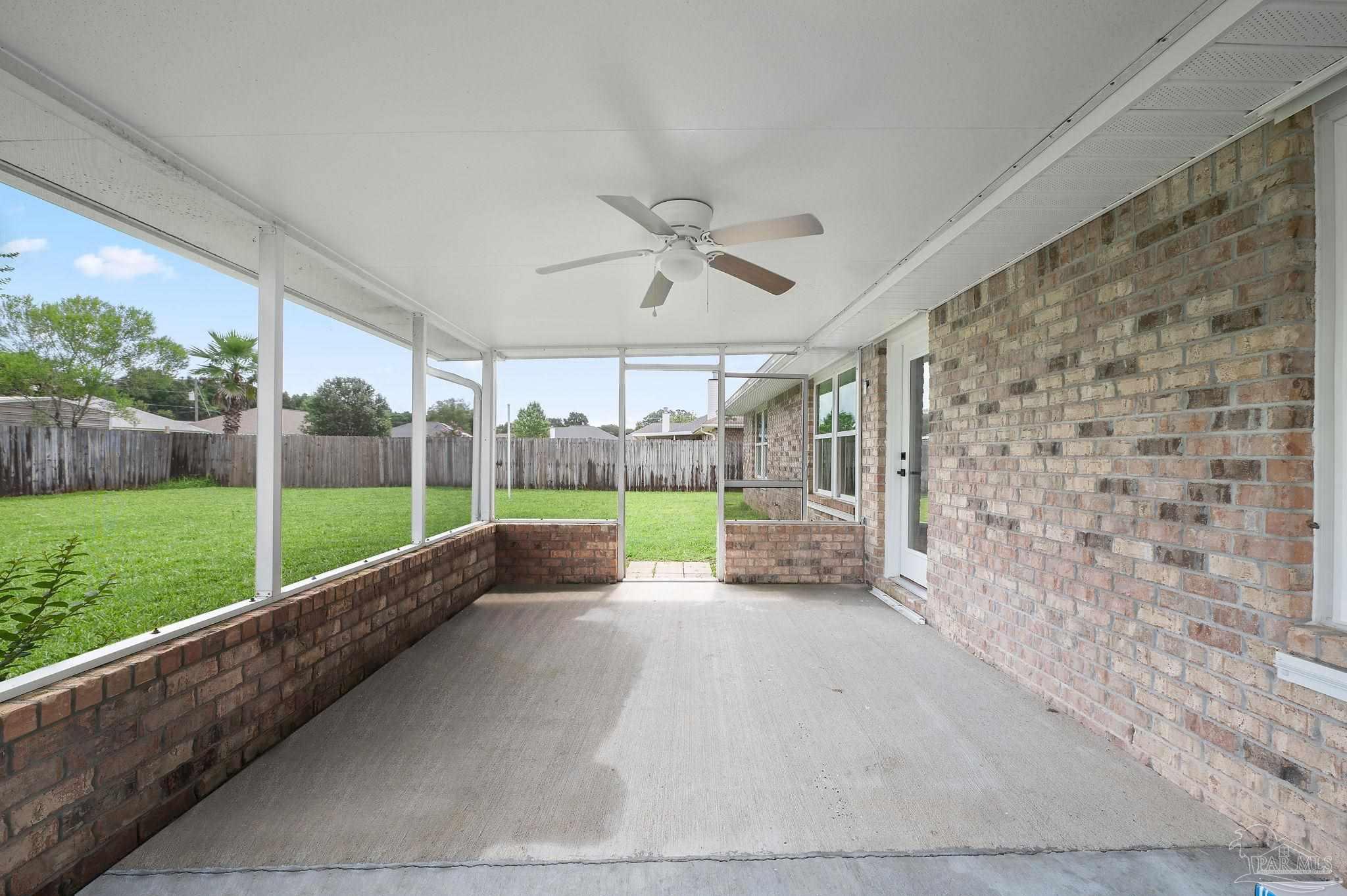 4290 Idell Lane Pace, FL 32571 - Photo 38 of 45 a view of a garden area