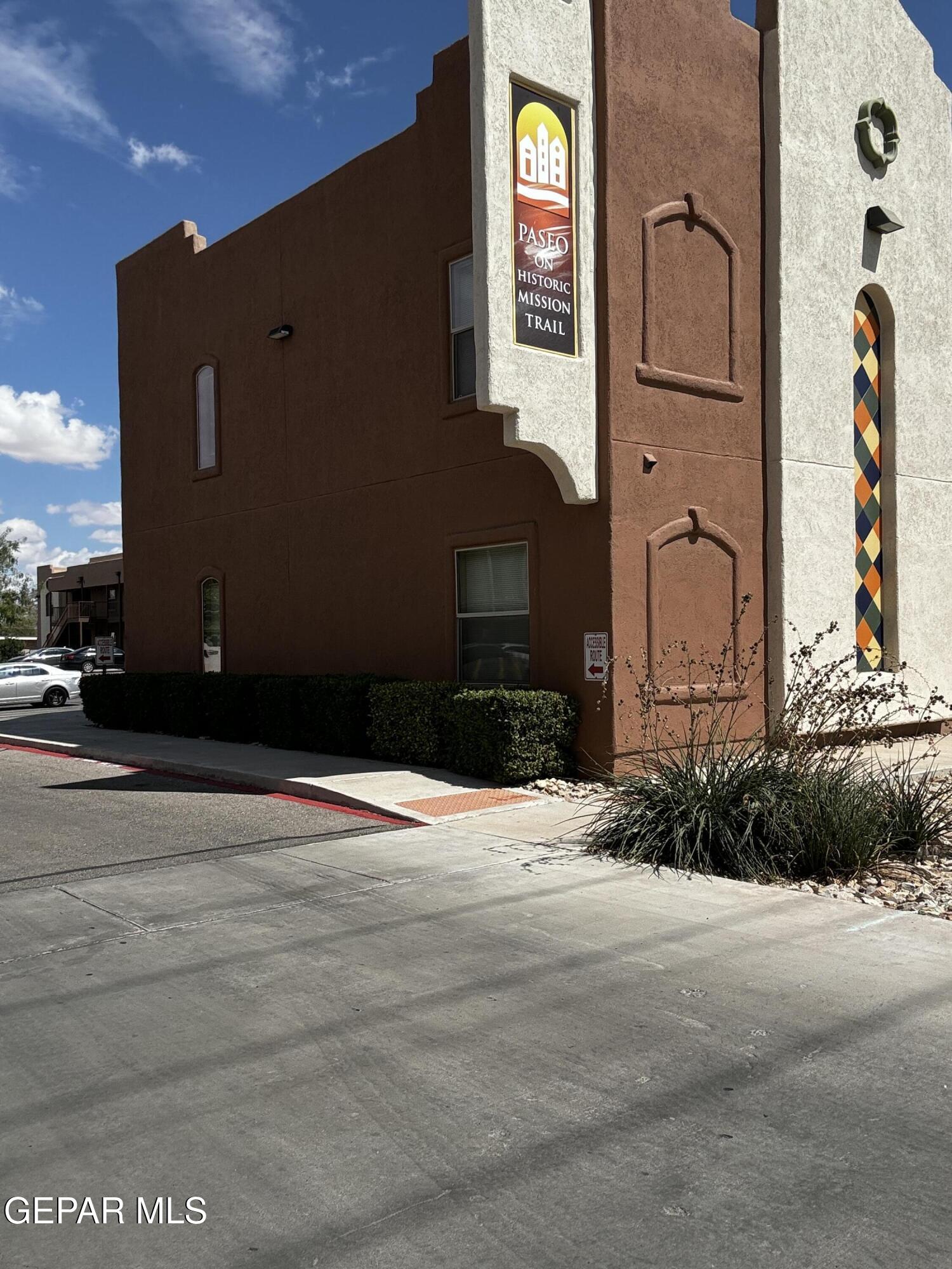 9811 Socorro Road, Unit 36 El Paso, TX 79927 - Photo 1 of 12 a front view of a house with a yard