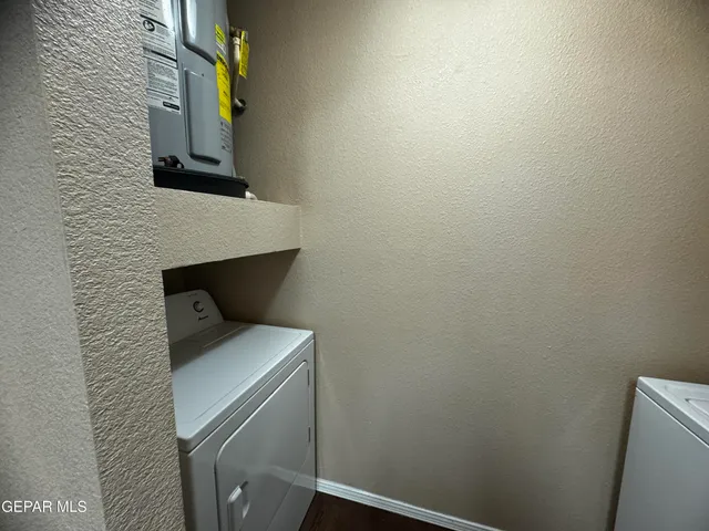 a bathroom with a toilet and a sink