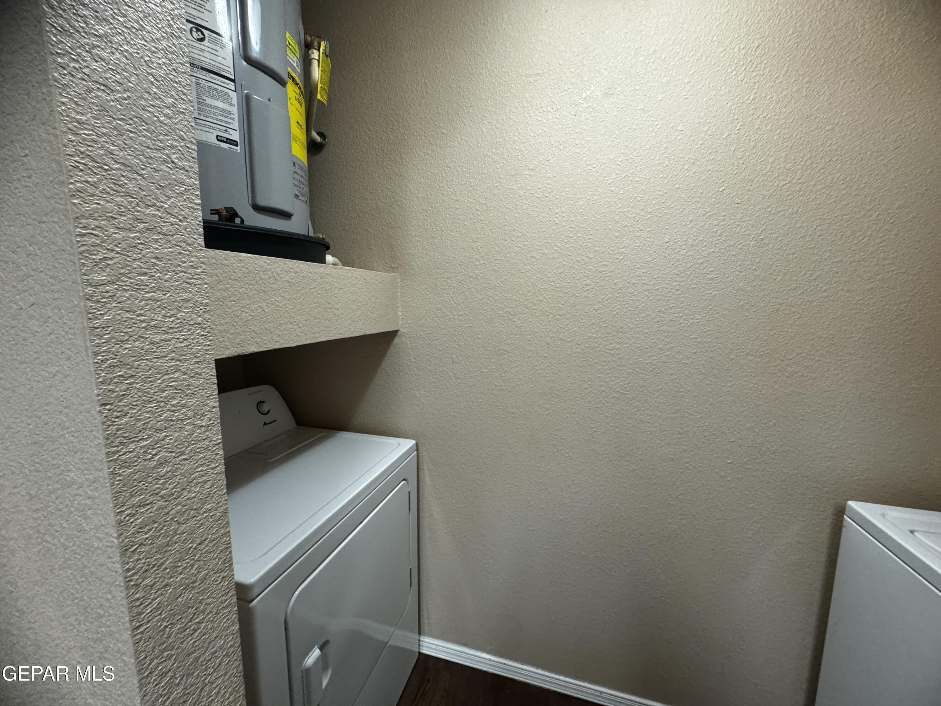 9811 Socorro Road, Unit 36 El Paso, TX 79927 - Photo 5 of 12 a bathroom with a toilet and a sink