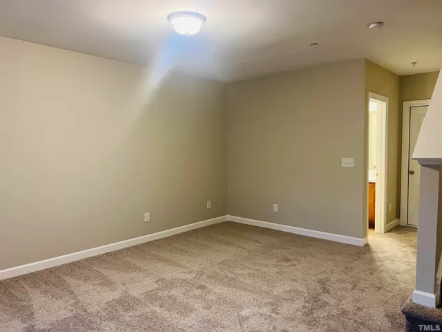 an empty room with a natural light