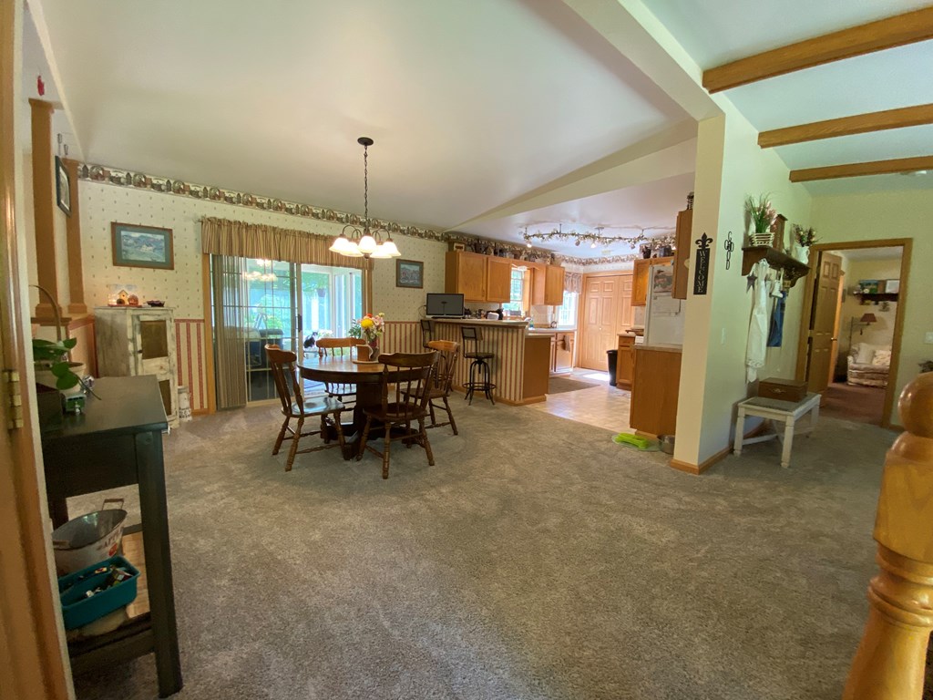 138 Center Church Road Polk, PA 16342 - Photo 13 of 64 a dining room with furniture and a chandelier