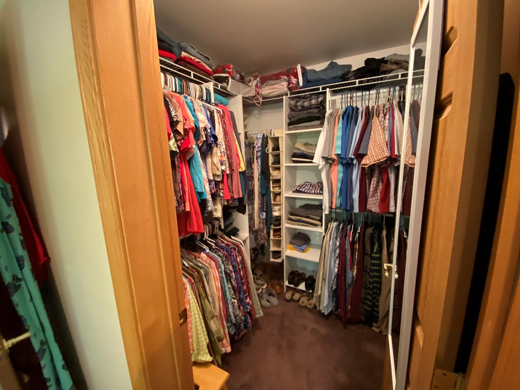 138 Center Church Road Polk, PA 16342 - Photo 33 of 64 a view of walk in closet with clothes