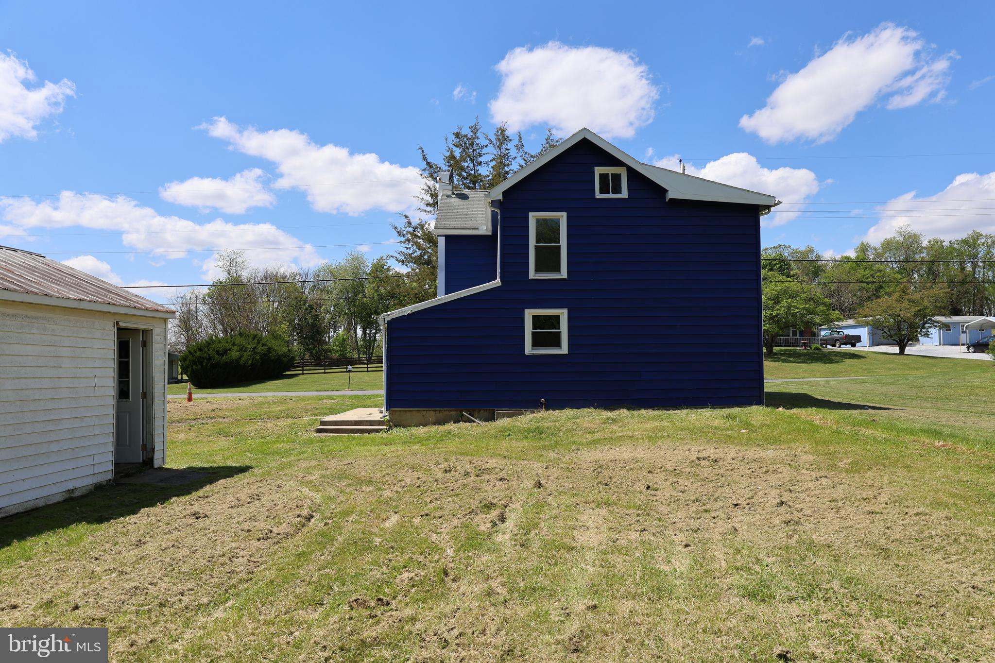 6213 Appletown Road Boonsboro, MD 21713 - Photo 4 of 18 a view of an house with backyard space and garden