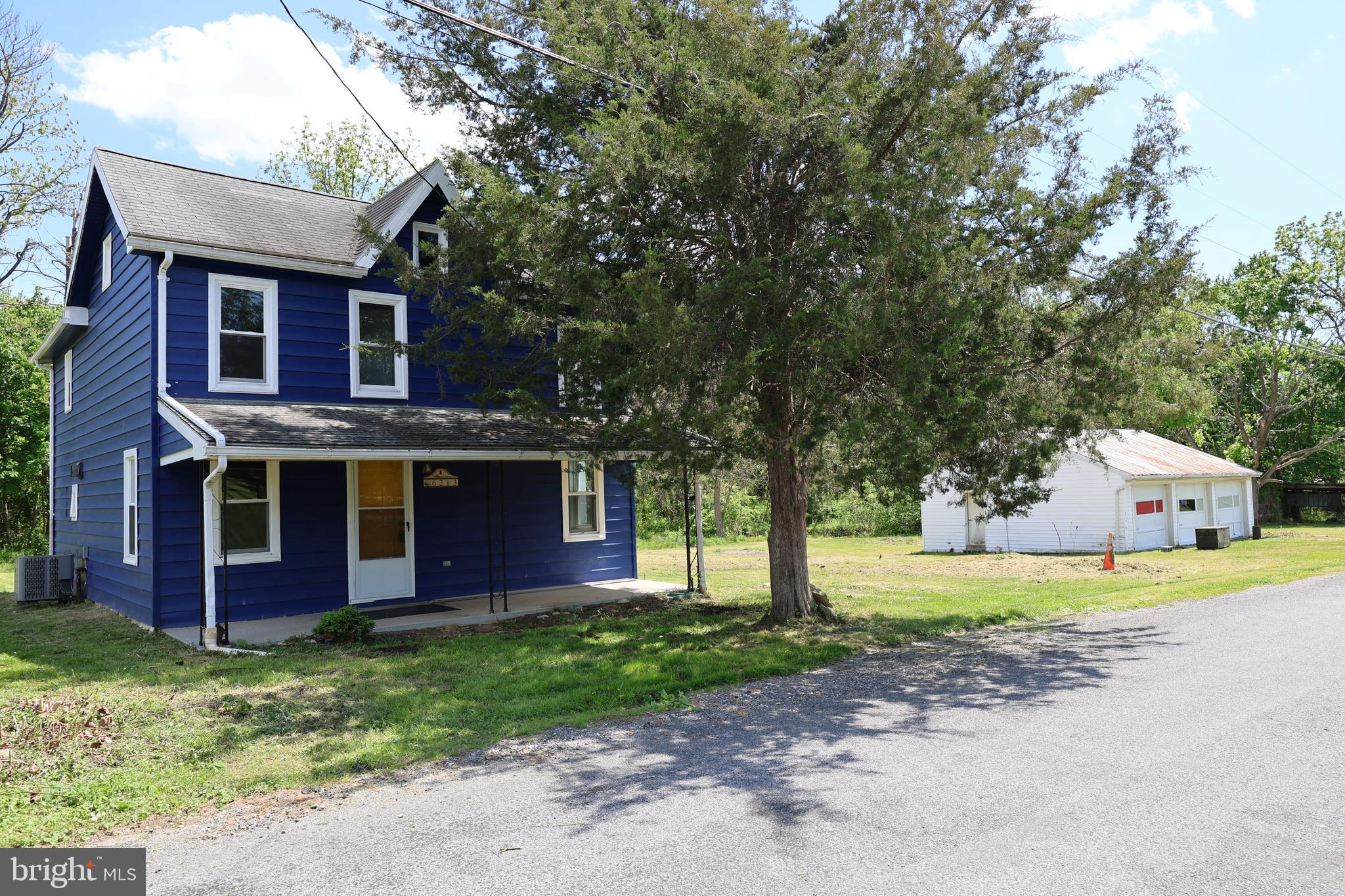 6213 Appletown Road Boonsboro, MD 21713 - Photo 5 of 18 a front view of house with yard and green space