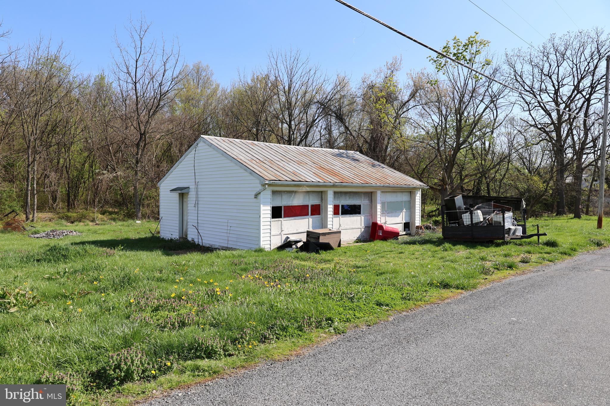 6213 Appletown Road Boonsboro, MD 21713 - Photo 6 of 18 a view of a house with a yard