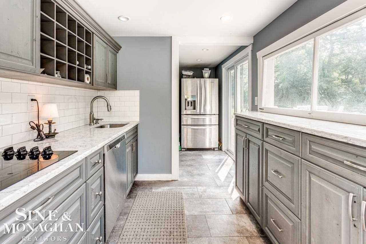2427 South Lakeshore Road Applegate, MI 48401 - Photo 22 of 55 Pool House Kitchen