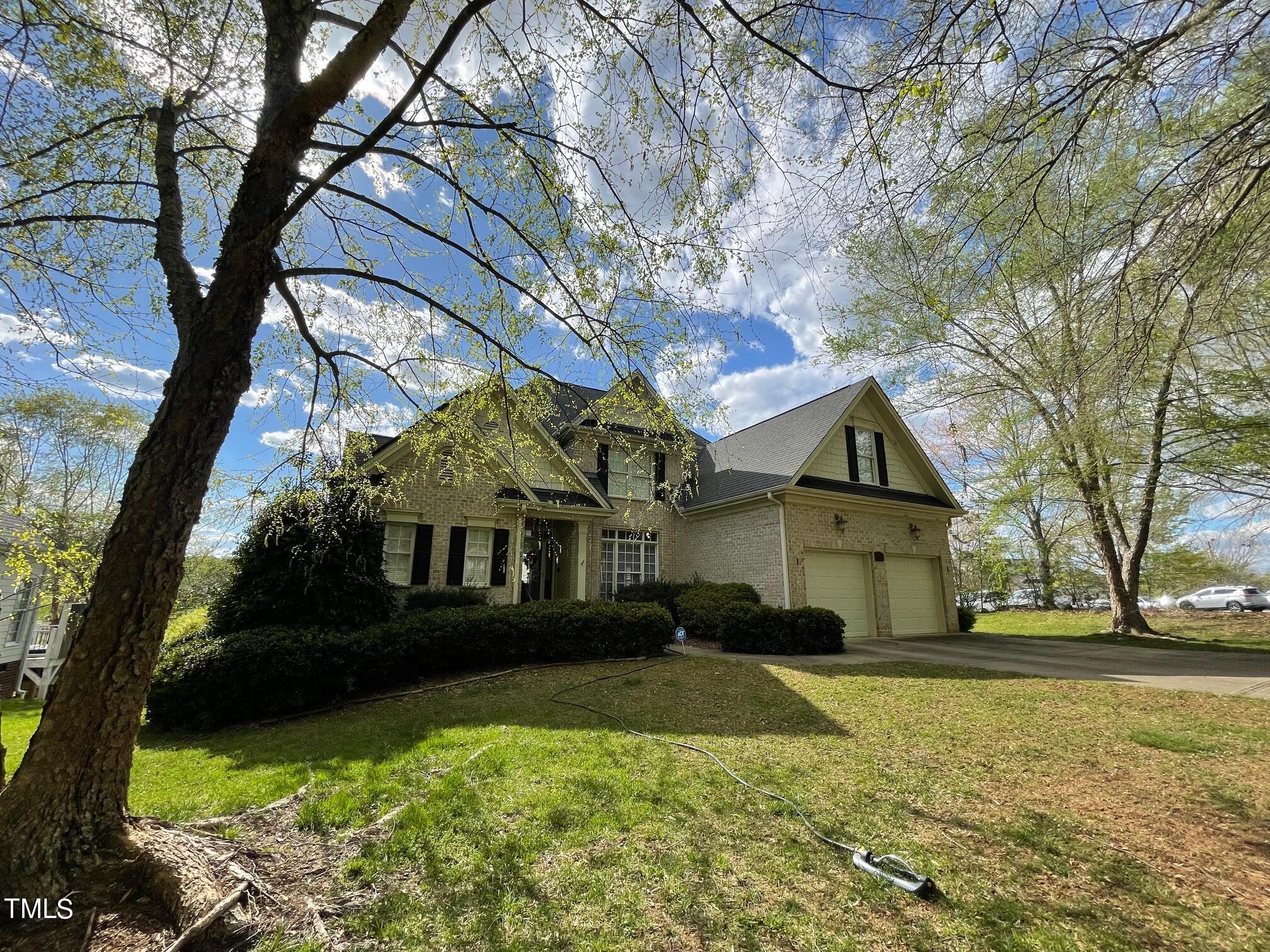 551 Competition Road Raleigh, NC 27603 - Photo 1 of 37 a front view of a house with a yard