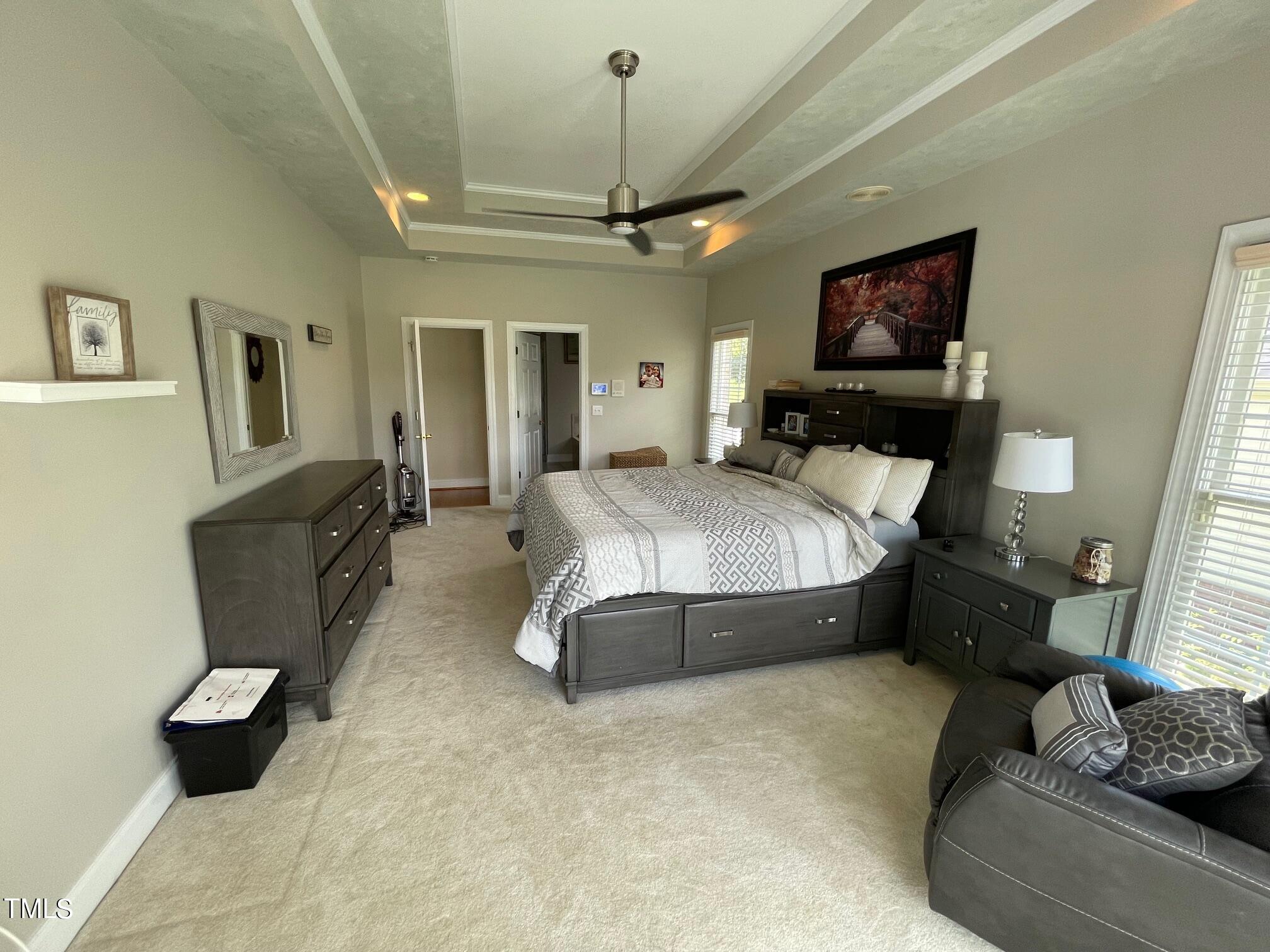 551 Competition Road Raleigh, NC 27603 - Photo 15 of 37 a spacious bedroom with a bed and furniture