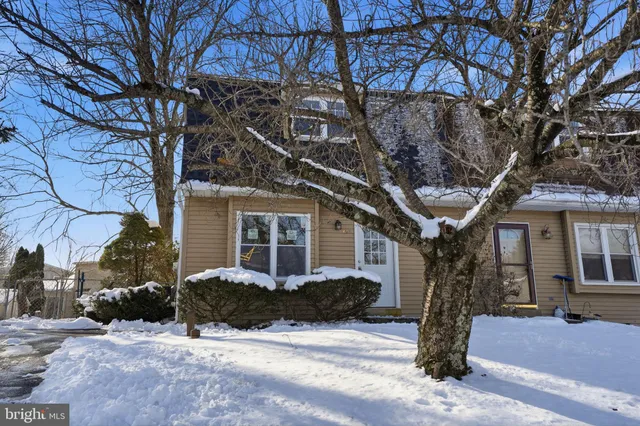 a view of a wooden fence