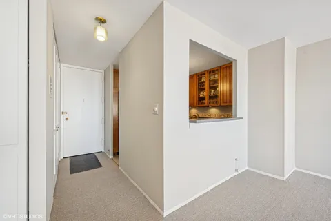 a kitchen with stainless steel appliances granite countertop a sink and a wooden cabinets