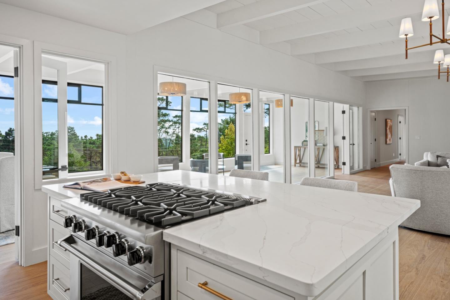 4171 Sunset Lane Pebble Beach, CA 93953 - Photo 12 of 38 a kitchen with a stove and a refrigerator