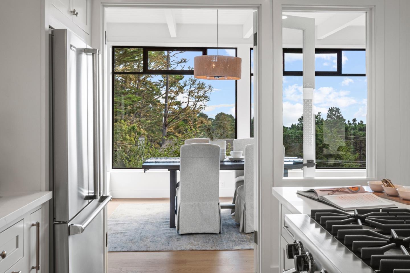 4171 Sunset Lane Pebble Beach, CA 93953 - Photo 16 of 38 a view of a kitchen with furniture and a window