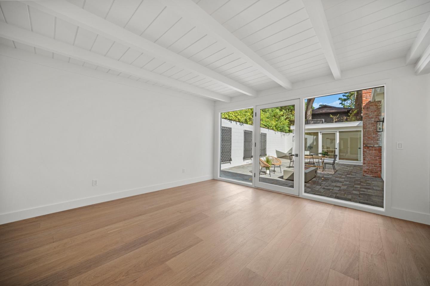 4171 Sunset Lane Pebble Beach, CA 93953 - Photo 25 of 38 an empty room with floor to ceiling window and outdoor view