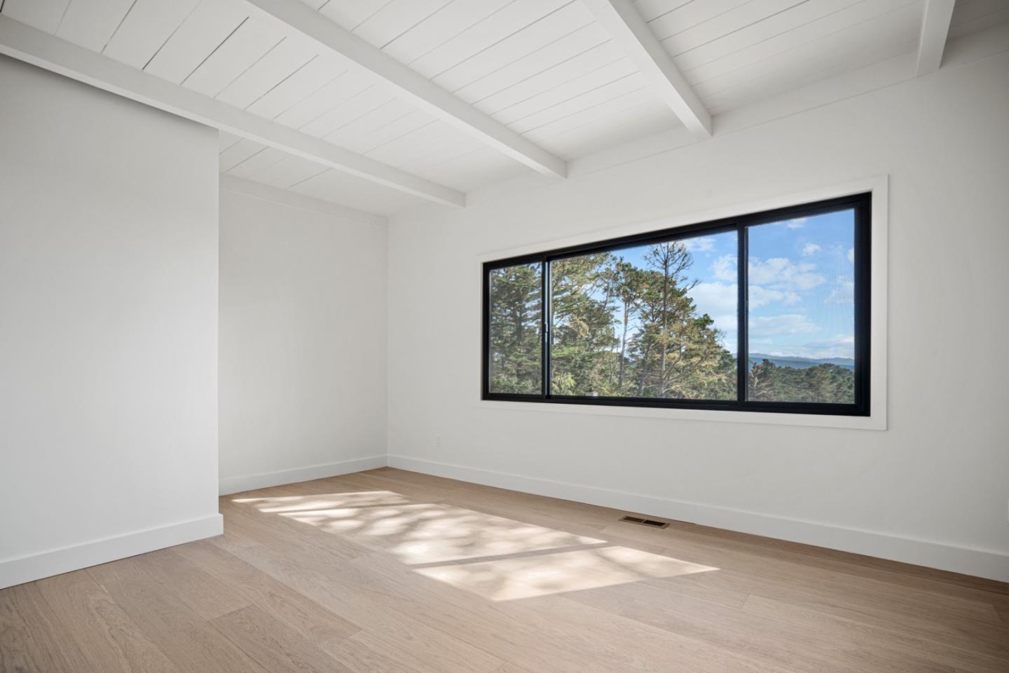 4171 Sunset Lane Pebble Beach, CA 93953 - Photo 29 of 38 an empty room with a window