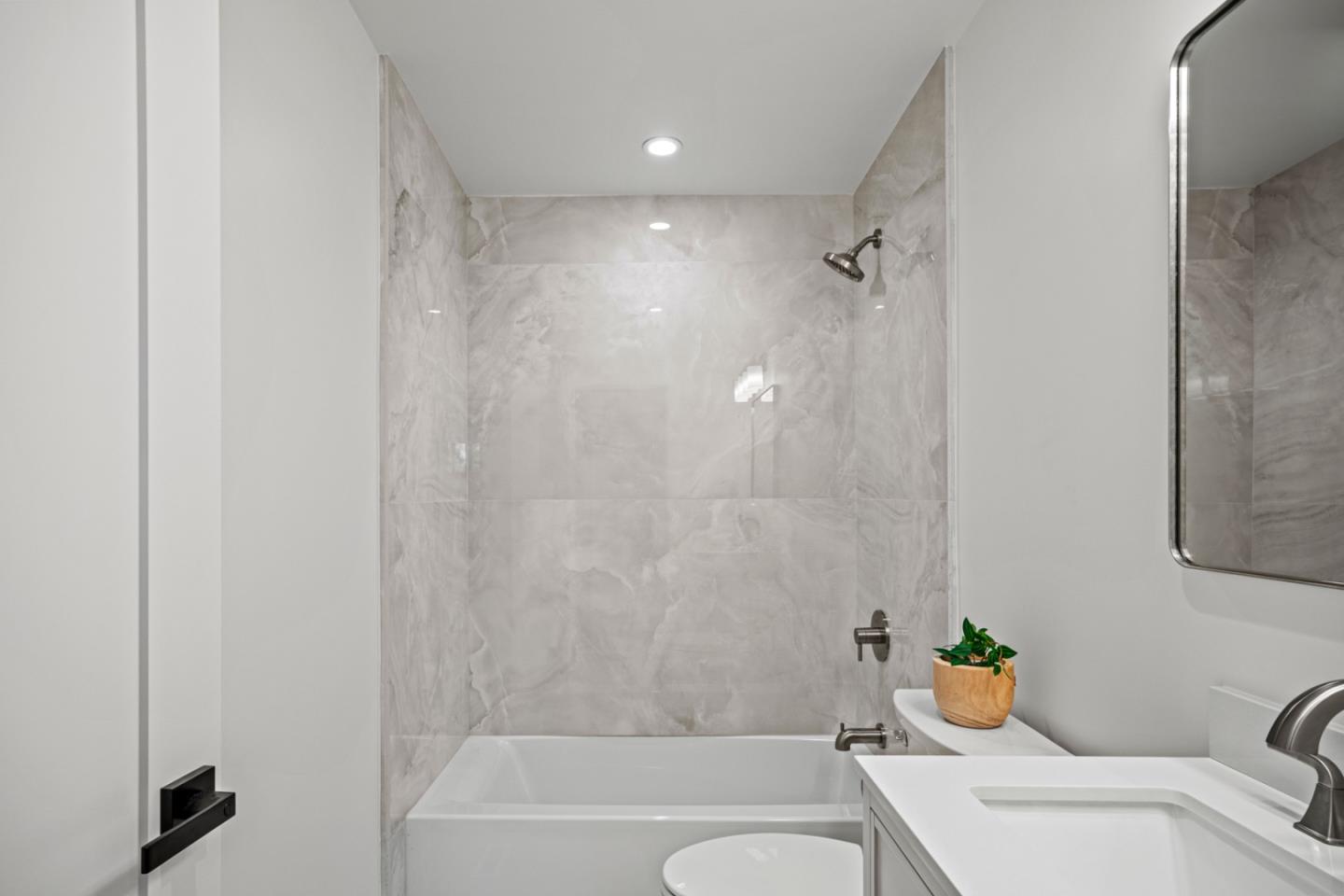 4171 Sunset Lane Pebble Beach, CA 93953 - Photo 30 of 38 a bathroom with a toilet and a bathtub