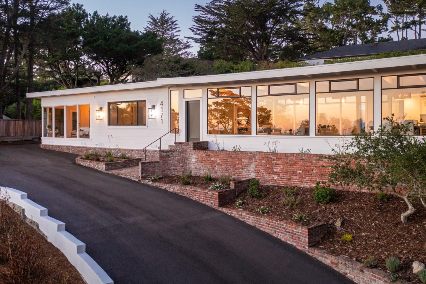 4171 Sunset Lane Pebble Beach, CA 93953 - Photo 38 of 38 a front view of house with yard and outdoor seating