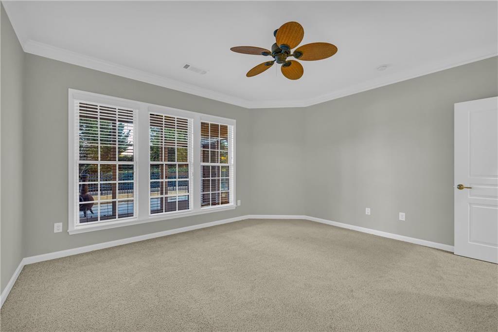 6116 Longleaf Drive Hoschton, GA 30548 - Photo 17 of 46 a view of an empty room with a window