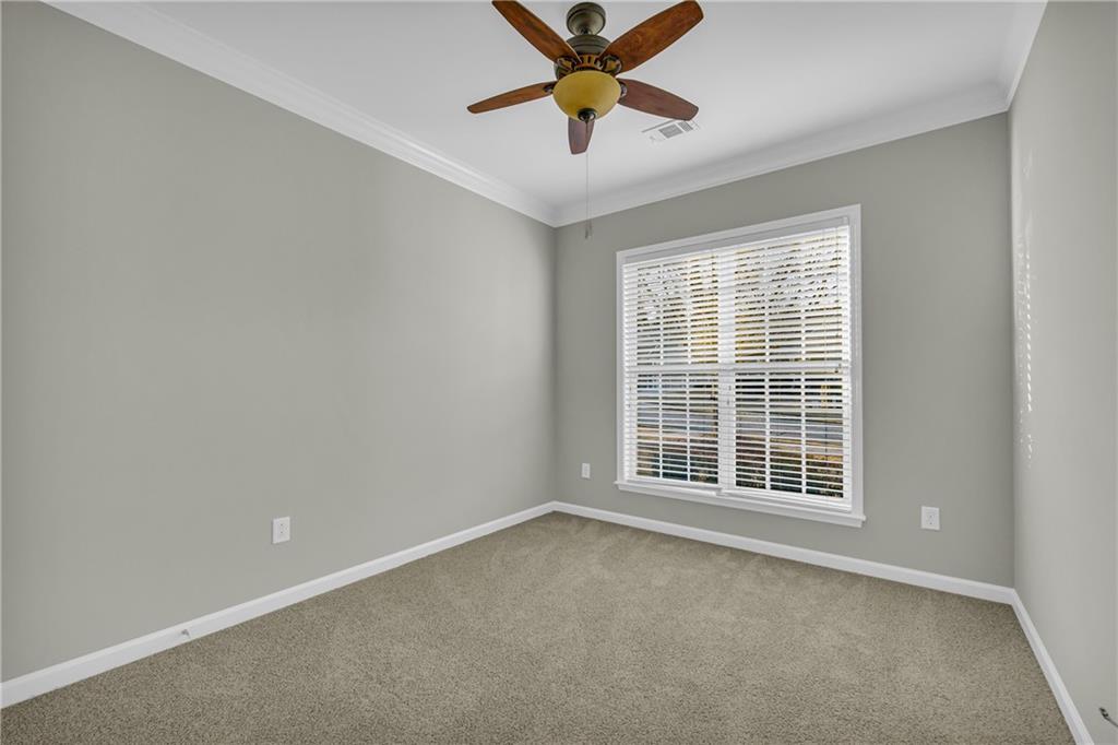 6116 Longleaf Drive Hoschton, GA 30548 - Photo 20 of 46 a view of an empty room with a window