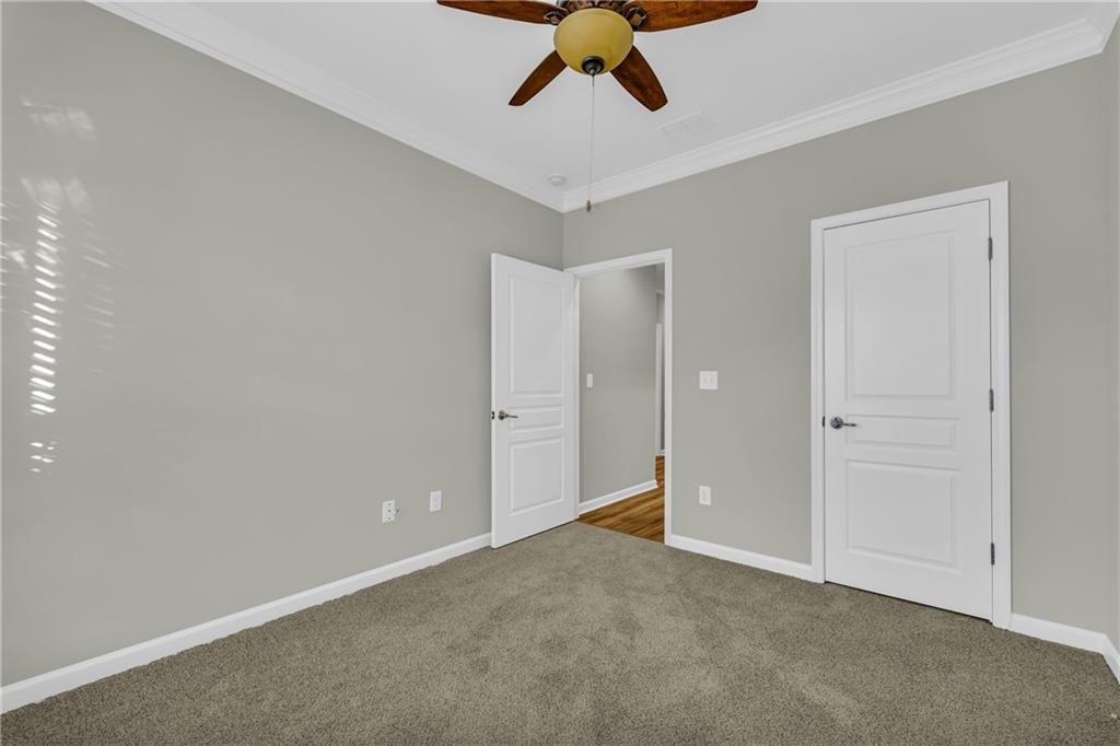 6116 Longleaf Drive Hoschton, GA 30548 - Photo 21 of 46 wooden floor in an empty room