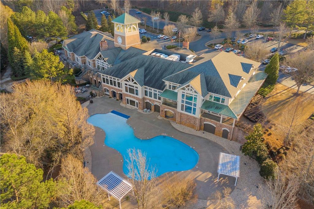 6116 Longleaf Drive Hoschton, GA 30548 - Photo 30 of 46 a view of swimming pool with outdoor seating