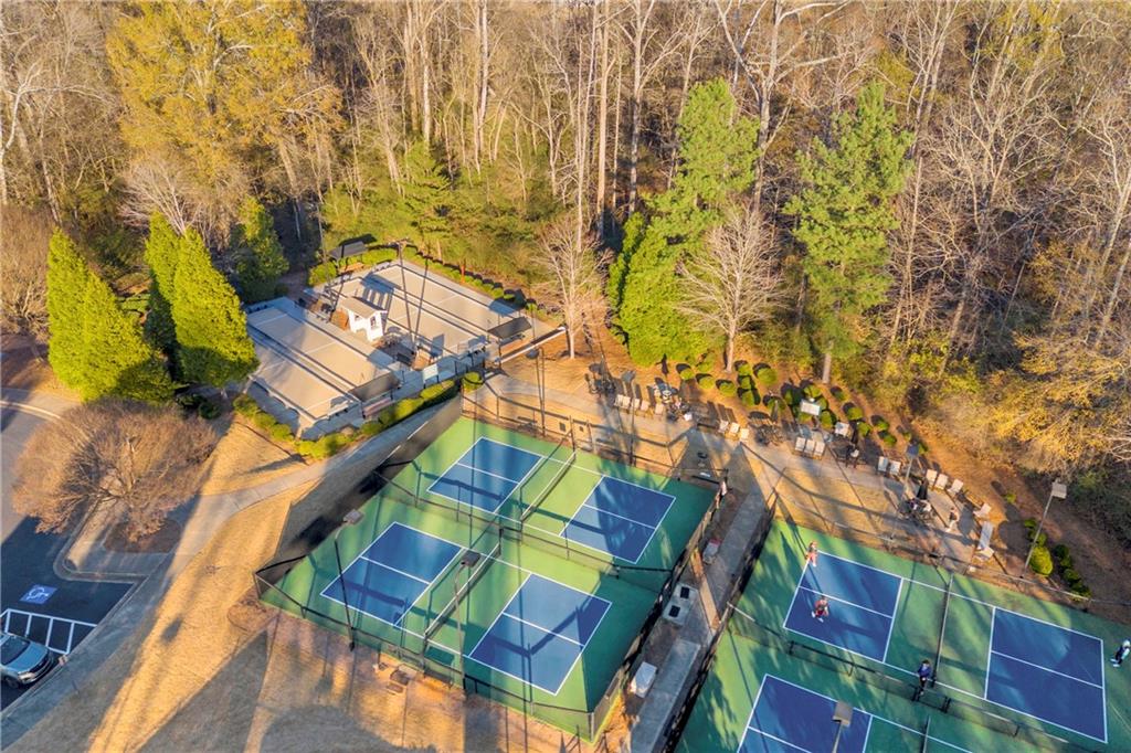 6116 Longleaf Drive Hoschton, GA 30548 - Photo 32 of 46 a backyard of a building with swimming pool