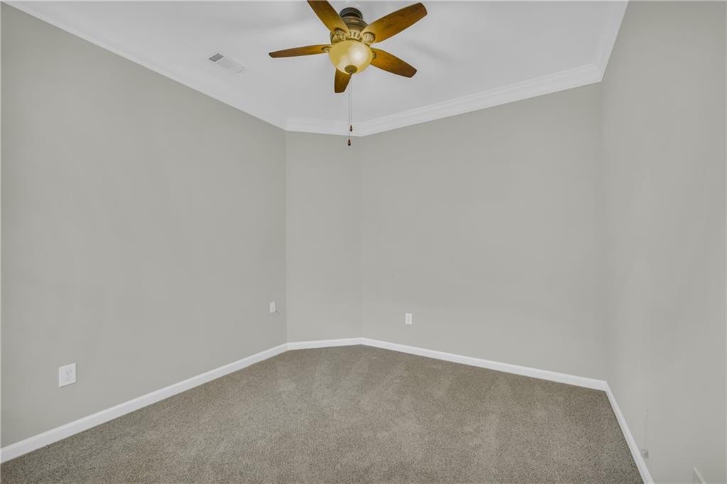 6116 Longleaf Drive Hoschton, GA 30548 - Photo 5 of 46 a view of an empty room