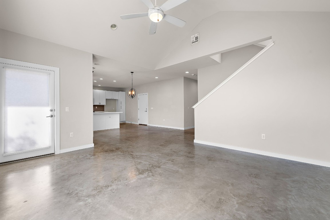 5616 South 1st Street, Unit 31 Austin, TX 78745 - Photo 4 of 21 an empty room with a empty space and windows