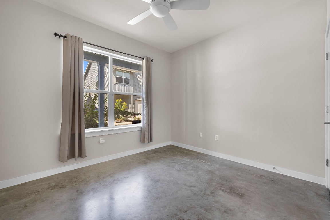 5616 South 1st Street, Unit 31 Austin, TX 78745 - Photo 9 of 21 a view of an empty room with a window