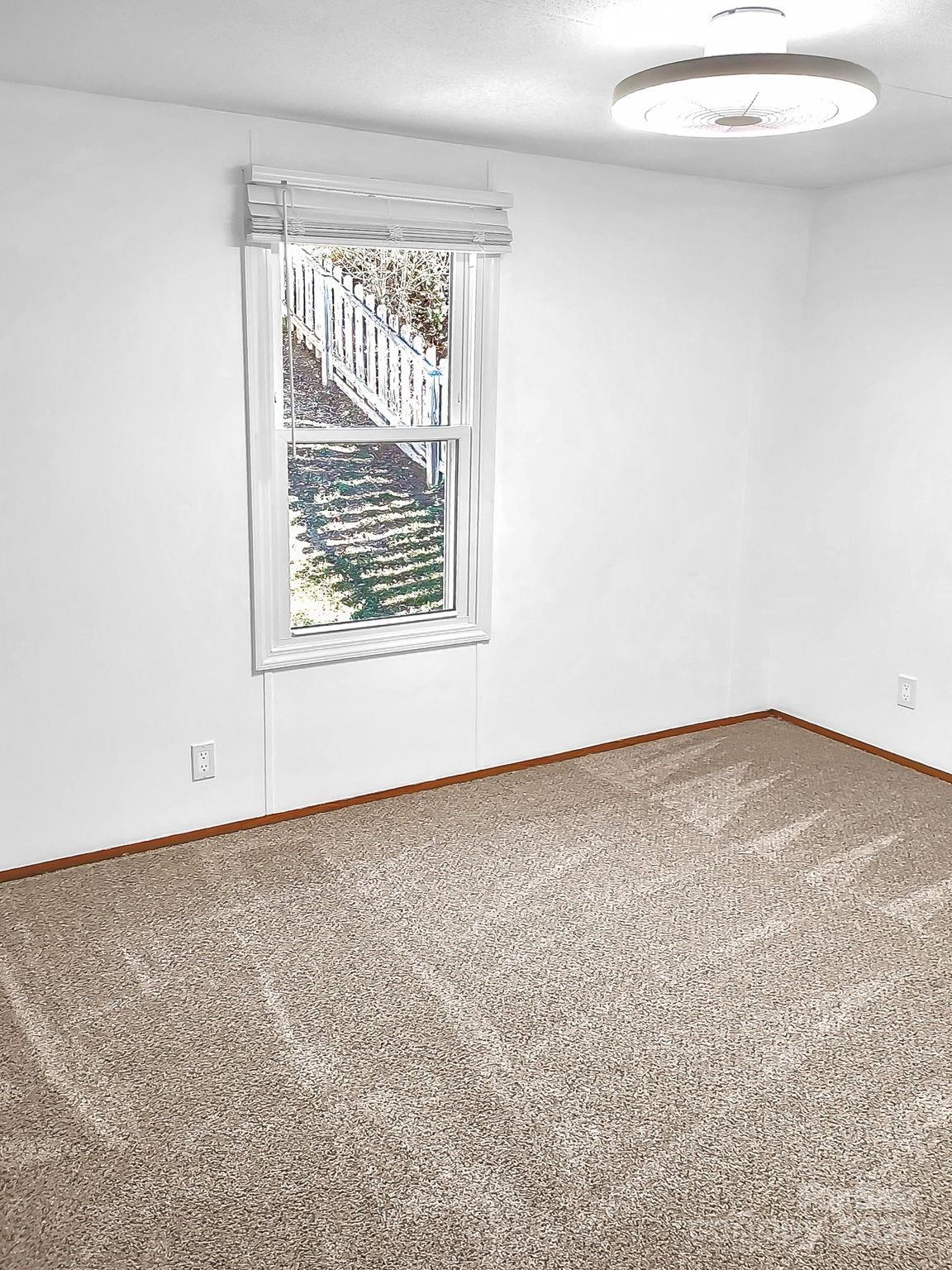 106 Hazy Day Swannanoa, NC 28778 - Photo 18 of 30 an empty room with a chandeliers